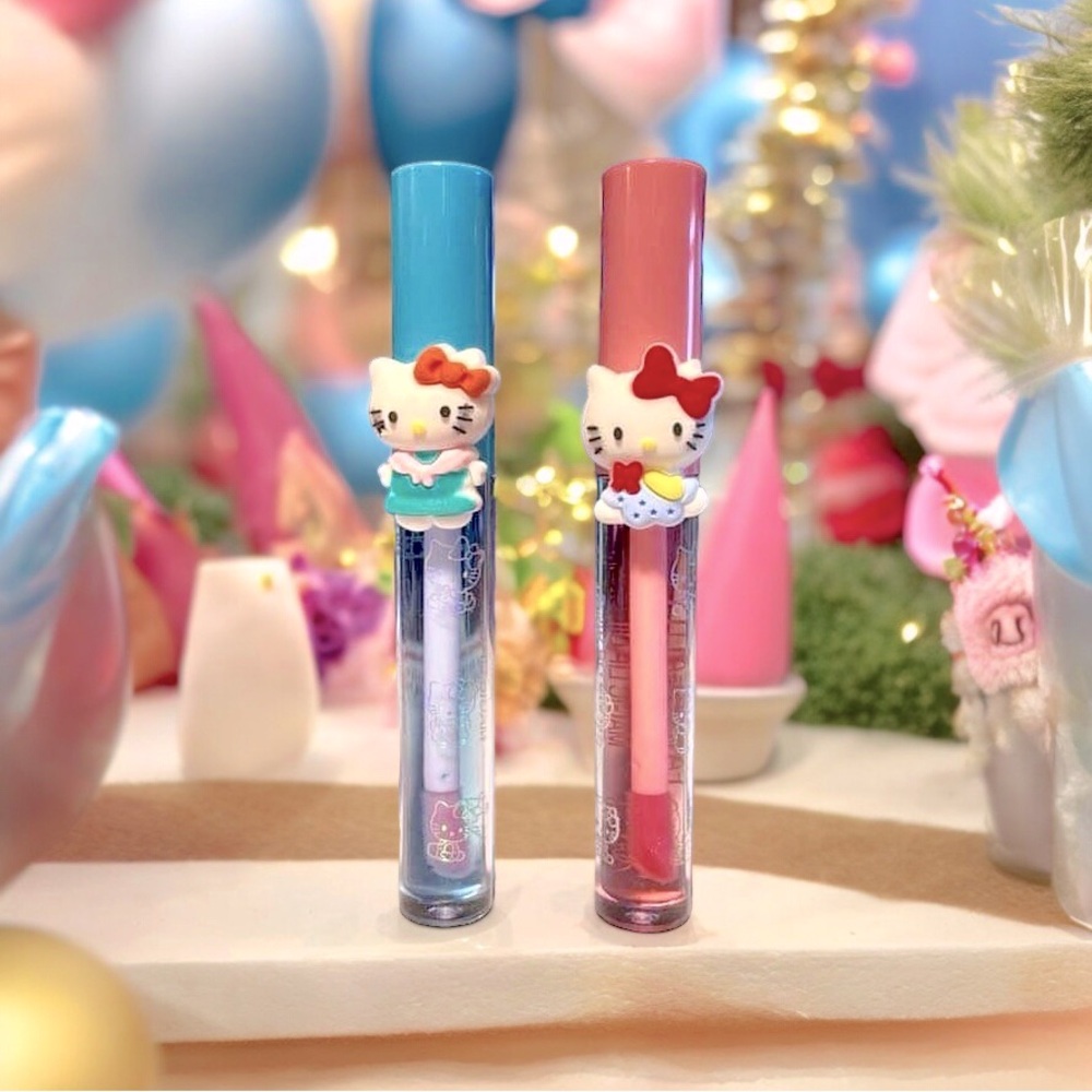 2 Hello Kitty Magic Lip Oil - Moisturizes And Magically Tints Your Lips! NEW!